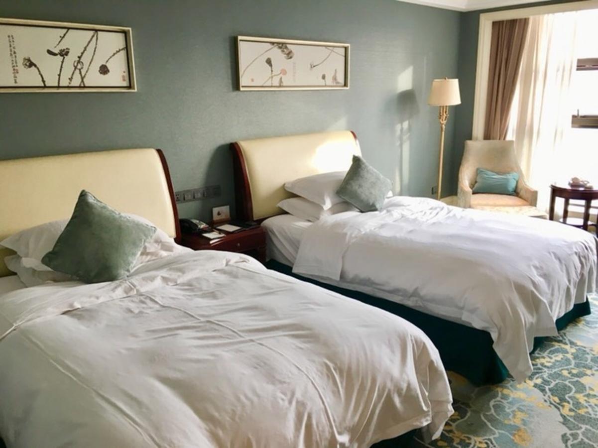 Dragon Dream Hotel Jiaxing Bagian luar foto